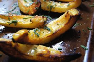 Roasted acorn squash on a sheet pan