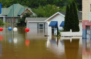 home with flood water around itl