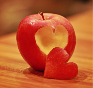 Apple with a heart cut out