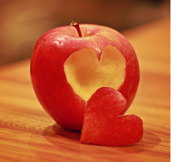 Apple with a heart cut out